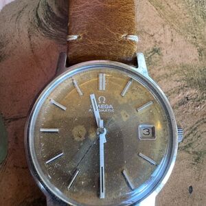 Omega Silver Watch with Tan Leather Strap